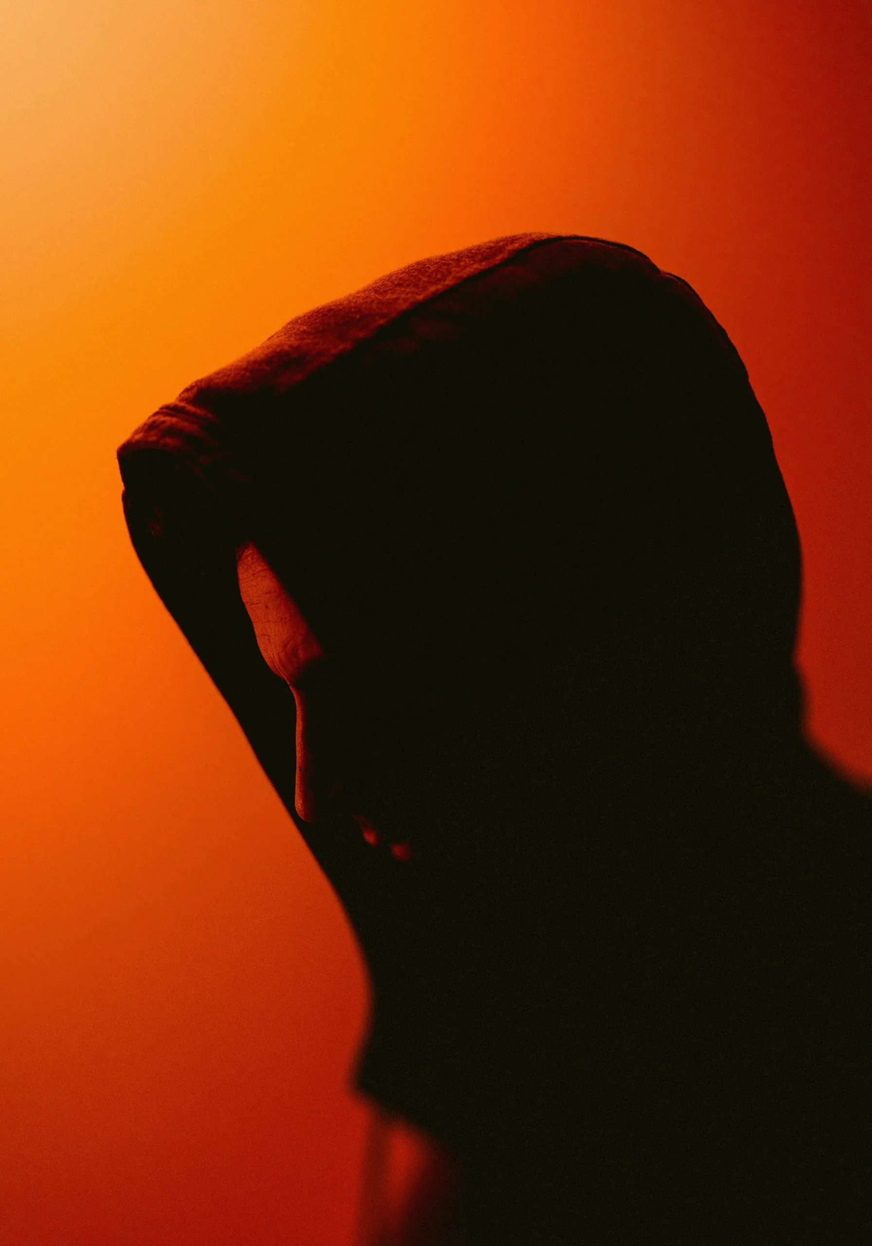 Silhouette against an orange backdrop