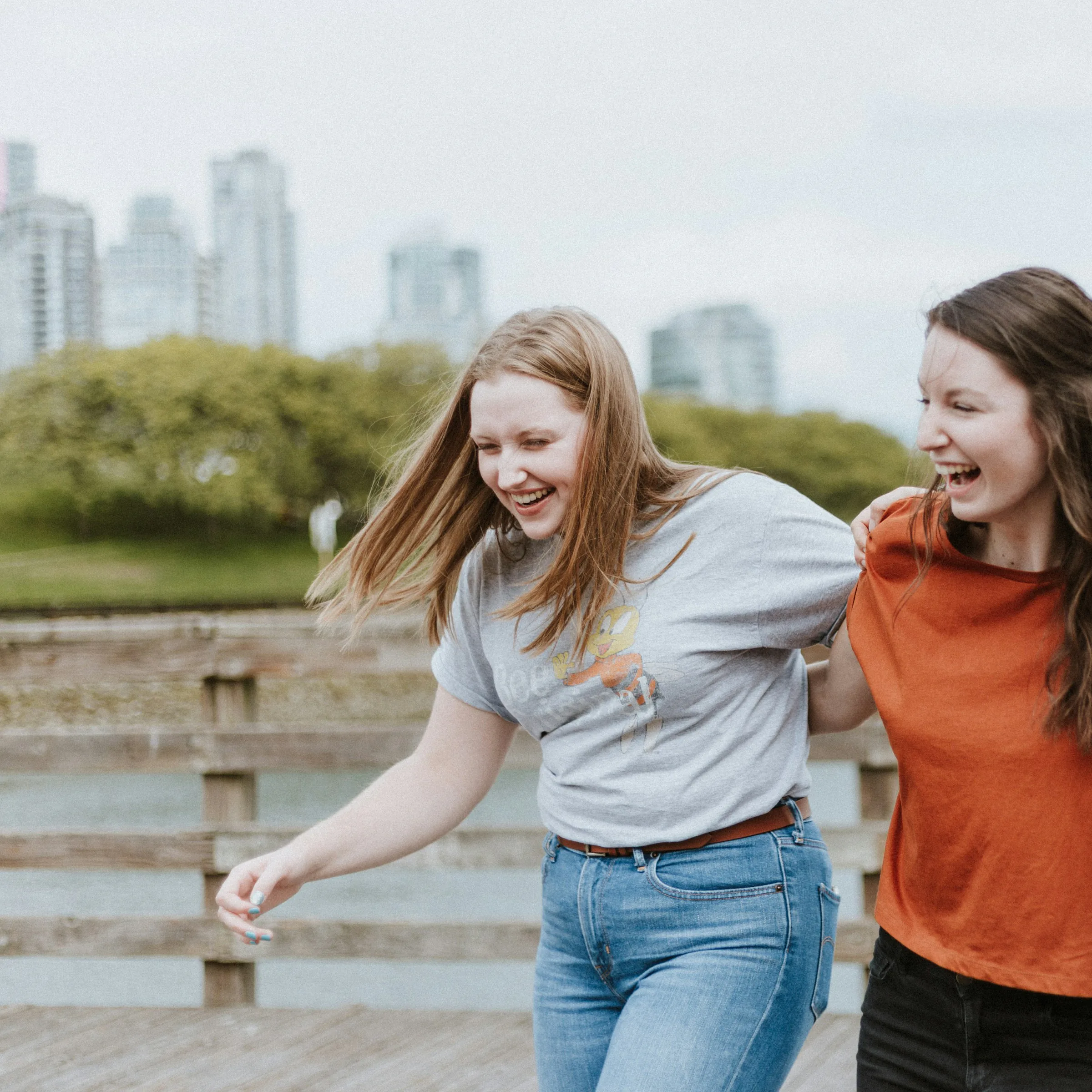 Friends laughing outdoors